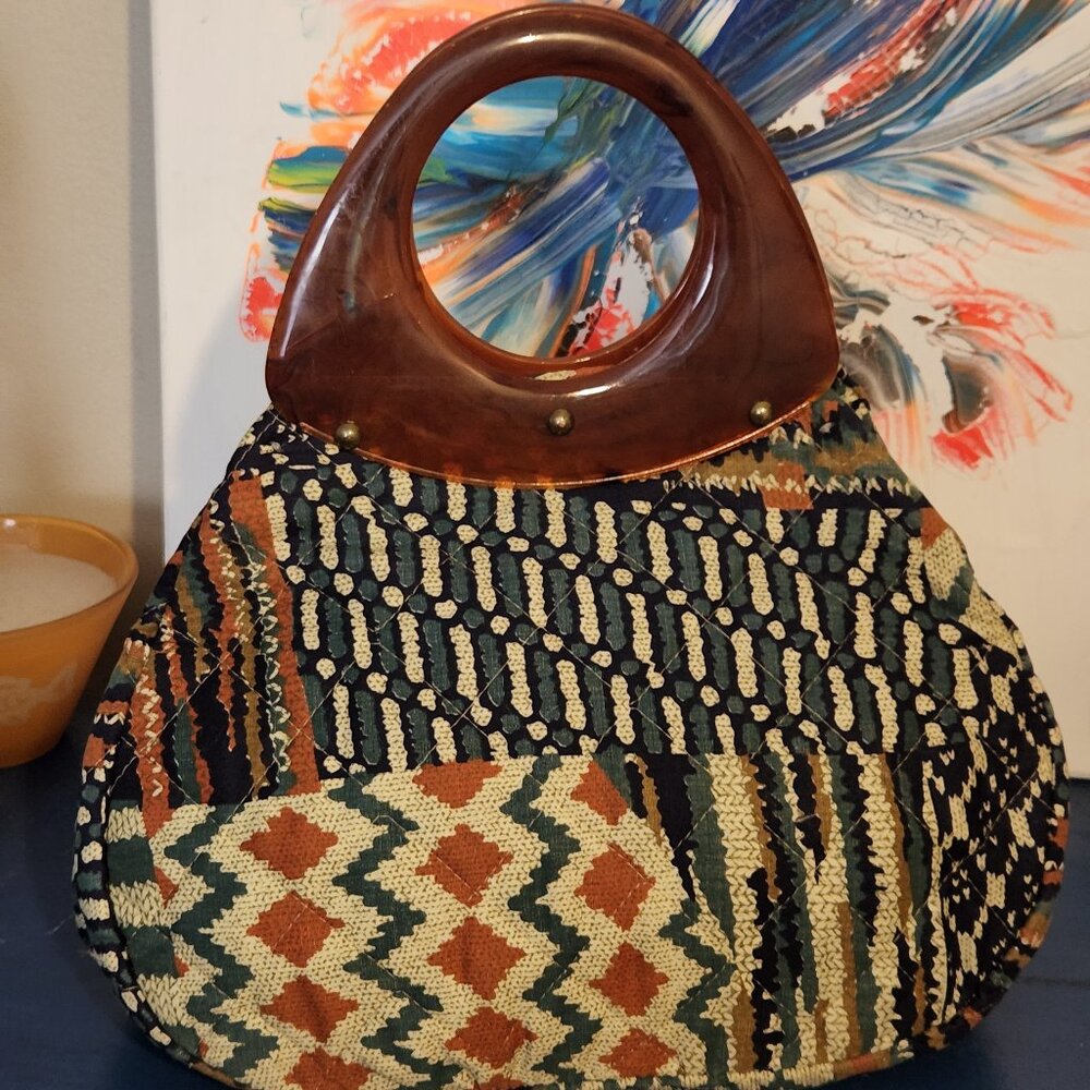 Small Unbranded multicolored insulated quilted fabric hand bag|snap closure